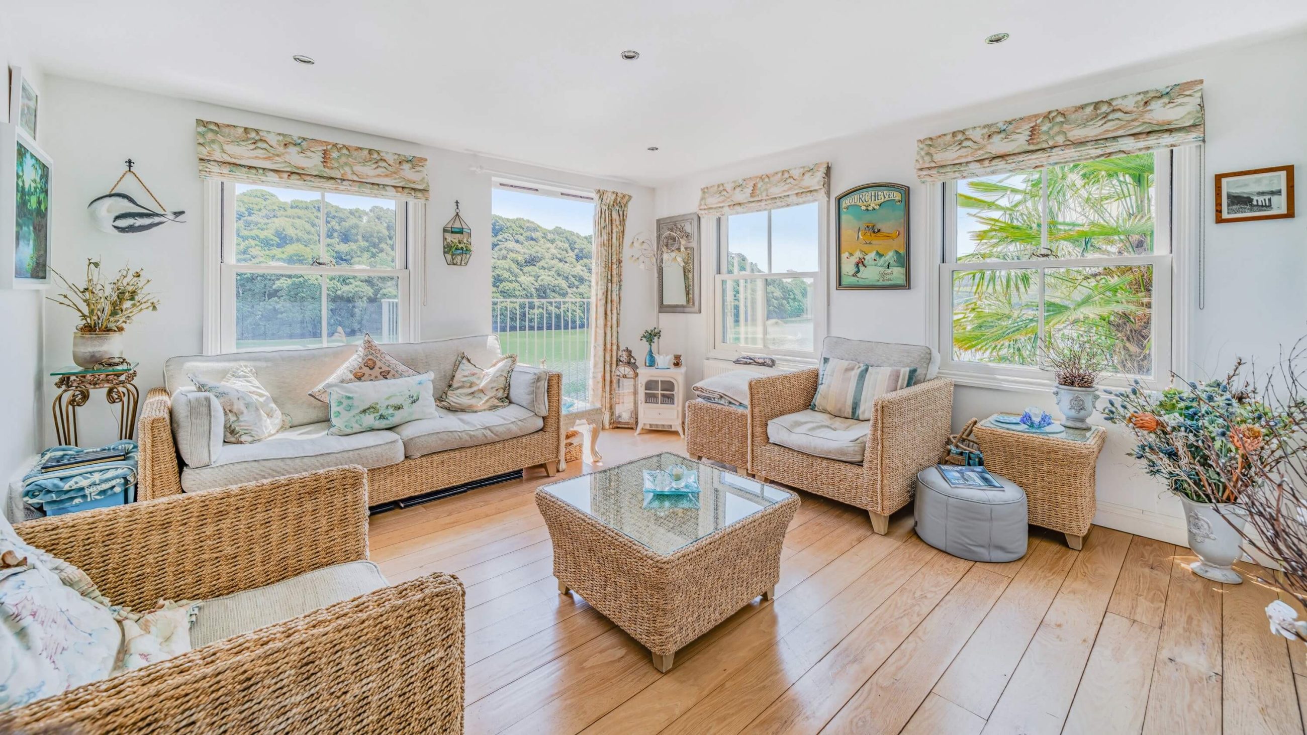 Interior property photography of sitting room with coastal views