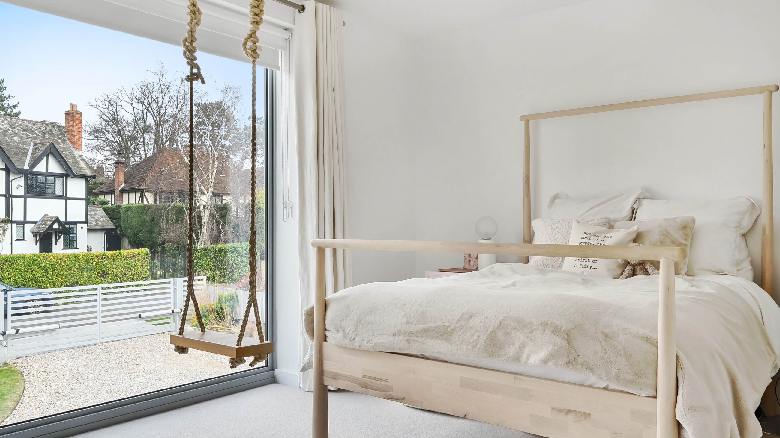 Photography of modern bedroom with garden outlook in modern home